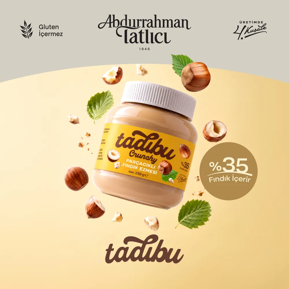 Krem zeminde Tadıbu Crunchy parçacıklı fındık ezmesi ve dökülen fındıklar